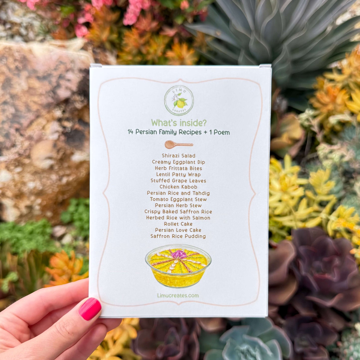 Back of Persian Recipe Card Collection Box listing what is inside. Includes Shirazi salad, Creamy eggplant dip, Herb frittata bites, Lentil patty wraps, Stuffed grape leaves, Chicken kabobs, Persian rice and tahdig, Tomato eggplant stew, Persian herb stew, Crispy baked saffron rice, herb rice with salmon, roller cake, Persian love cake, and Saffron rice pudding. Includes watercolor illustration of Saffron rice pudding.